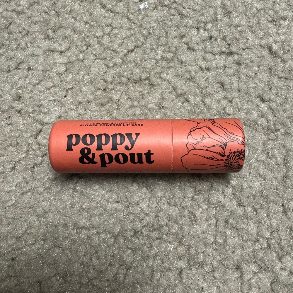 NWT poppy & pout lip balm, scent: pomegranate peach